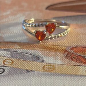 Elegant Silver Heart Ring with Red Stones